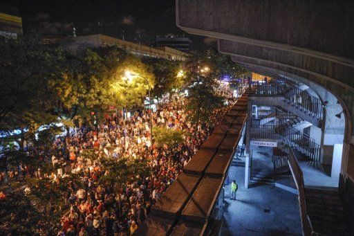 Fans wait outside the Estadio de Vallecas ground