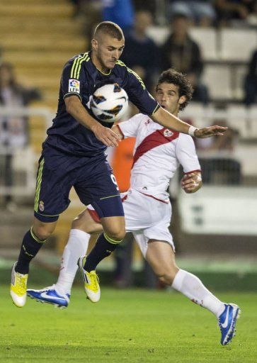 Real Madrid&#039;s Karim Benzema controls the ball