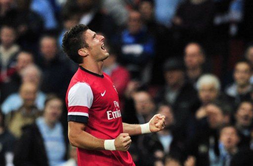 Arsenal&#039;s Olivier Giroud celebrates scoring the opening goal