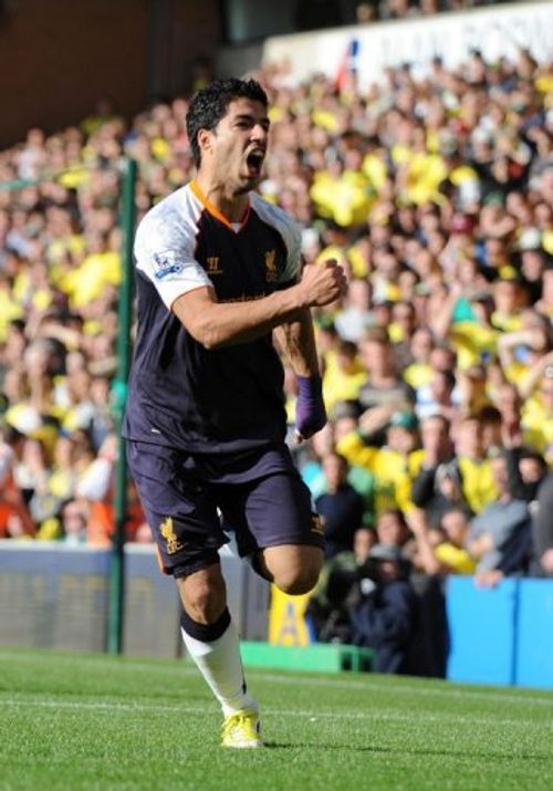 Liverpool's striker Luis Suarez celebrates scoring