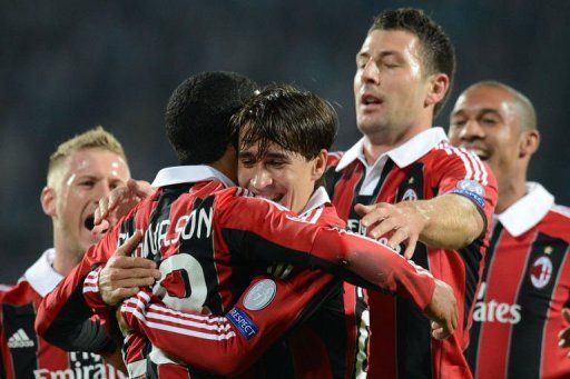 Urby Emanuelson (2nd L) and Bojan Krkic (C) of AC Milan celebrate after scoring