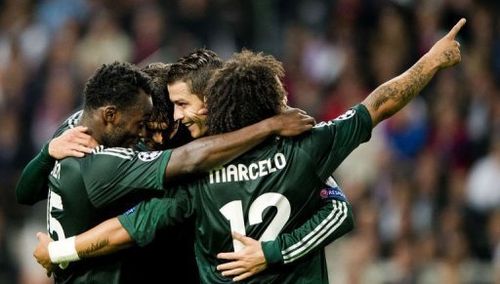 Real Madrid's Cristiano Ronaldo (2nd R) celebrates with teammates after scoring