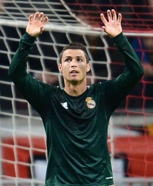 Real Madrid's Cristiano Ronaldo reacts after scoring