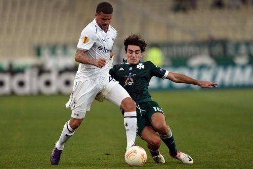 Lazaros Christodoulopoulos (R) of Panathinaikos tackles Tottenham&#039;s Kyle Walker