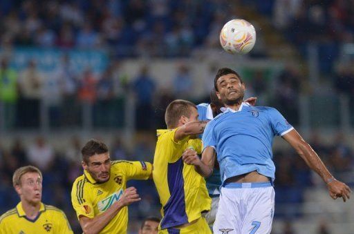 Lazio&#039;s midfielder Ederson Honorato Campos (R) heads the ball