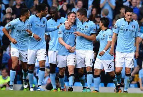 Manchester City's James Milner (4th left) scored the final goal in the 89th minute with a deflected free-kick