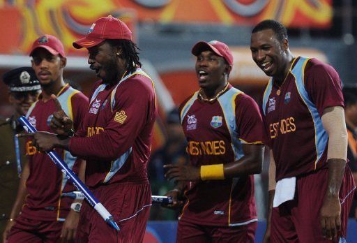 Chris Gayle (2nd L) crushed Australia in Friday&#039;s semi-final with a scintillating 75 off 41 balls