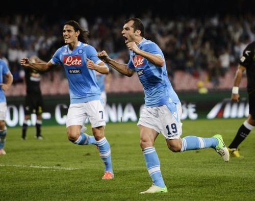 SC Napoli's Goran Pandev (R) celebrates with teammate Edinson Cavani after scoring