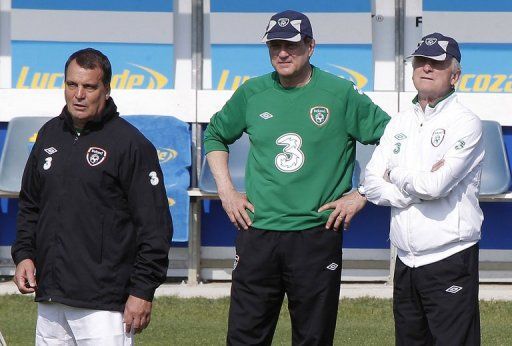 Republic of Ireland coach Giovanni Trapattoni (R) with assistant coaches Marco Tardelli (L) and Fausto Rossi (C)