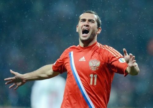 Russia's national football team player Aleksandr Kerzhakov celebrates scoring a goal