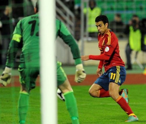 Spain's midfielder Pedro scoring a goal during the FIFA 2014 World Cup qualifying match against Belarus