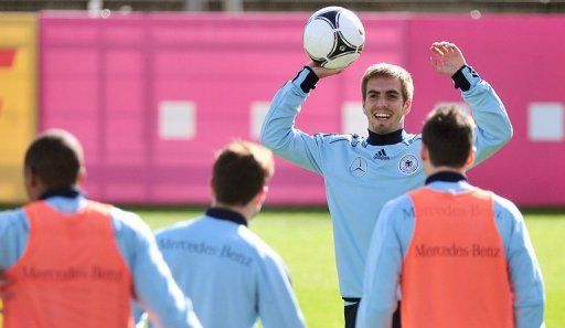 Germany captain Philipp Lahm takes part in a training session with teammates in Berlin on Sunday