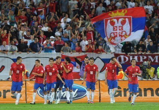 Serbia&#039;s players celebrate a goal in September