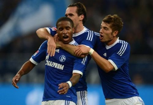 (L-R) Schalke's Jefferson Farfan, Christian Fuchs and Roman Neustaedter during a Bundesliga match