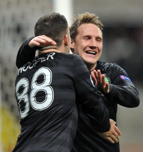 Celtic&#039;s Kris Commons (R) and Gary Hooper during their Champions League match against Spartak Moskva