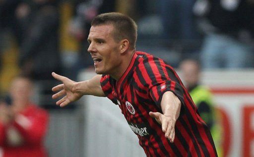 Frankfurt&#039;s midfielder Alexander Meier celebrates scoring