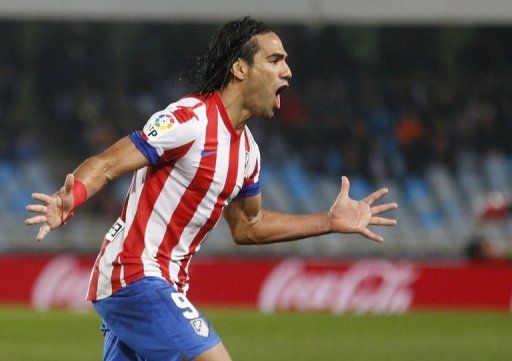 Atletico Madrid&#039;s Radamel Falcao celebrates after scoring