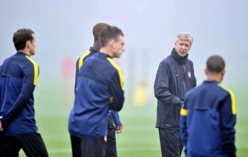 Arsenal&#039;s French manager Arsene Wenger attends training at London Colney