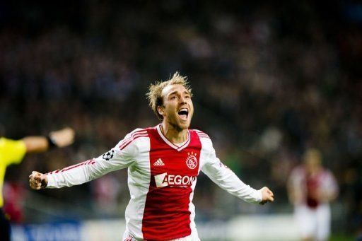 Ajax&#039; Christian Eriksen celebrates after scoring against Manchester City