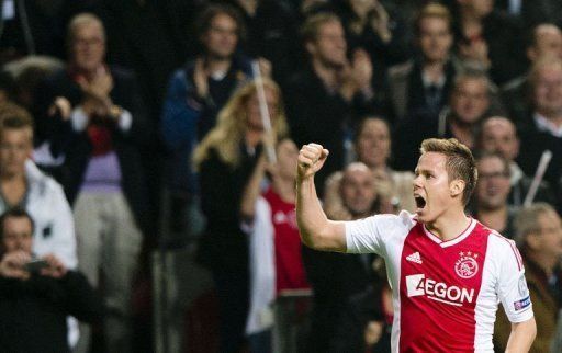 Ajax&#039; Niklas Moisander celebrates after scoring