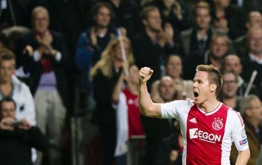 Ajax&#039; Niklas Moisander celebrates after scoring against Manchester City