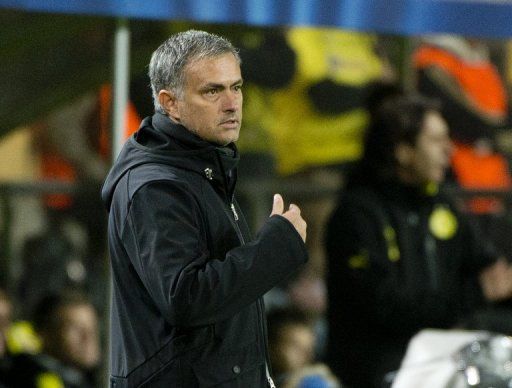 Jose Mourinho says Real are still on course for the Champions League knock-out stages despite their defeat at Dortmund