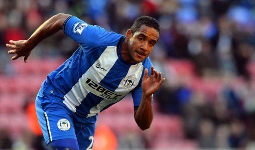 Wigan Athletic&#039;s midfielder Jean Beausejour chases the ball