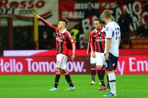 AC Milan&#039;s forward Stephan El Shaarawy (L) celebrates after scoring