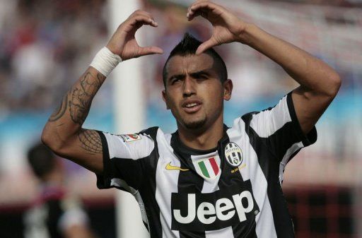 Juventus&#039;s Arturo Vidal celebrates after scoring