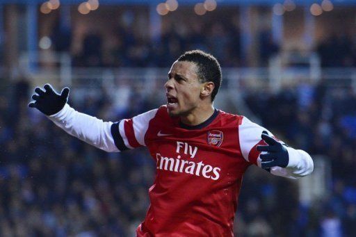 Arsenal&#039;s Francis Coquelin celebrates scoring against Reading in Tuesday&#039;s game