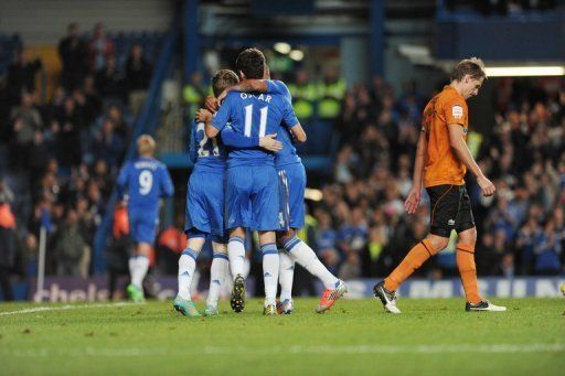 Chelsea players celebrate their goal against Wolverhampton Wanderers in League Cup match on September 25