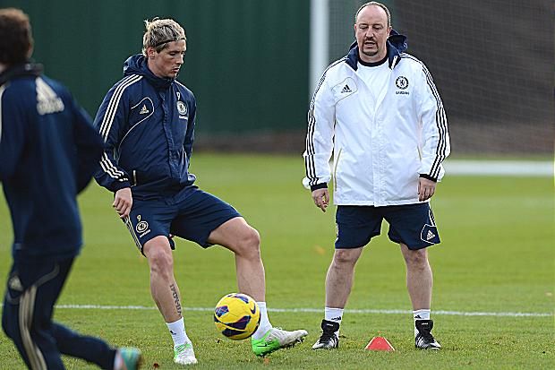 Do you remember me? Rafael Benitez watches Fernando Torres and the rest of the squad train ahead of their crunch meeting with Manchester City