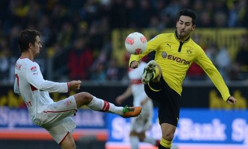 Stuttgart's striker Martin Harnik (L) and Dortmund's midfielder Ilkay Guendogan fight for the ball