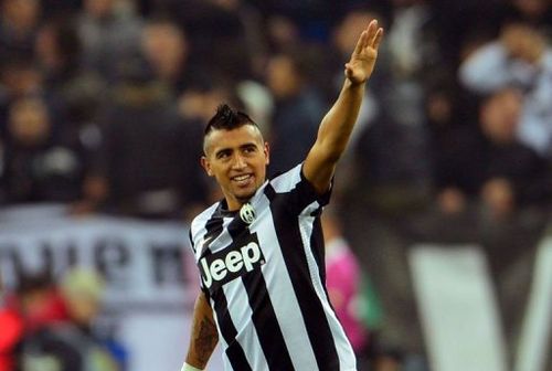 Juventus' midfielder Arturo Vidal celebrates after scoring