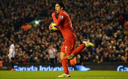 Liverpool&#039;s Luis Suarez celebrates scoring