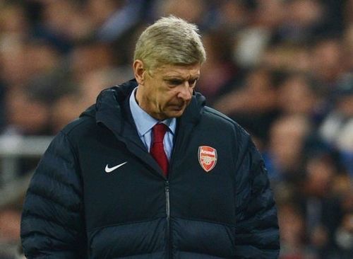 Arsenal's French head coach Arsene Wenger looks dejected during Tuesday's match away to Schalke 04