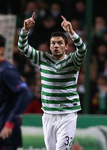 Celtic&#039;s Tony Watt celebrates scoring against Barcelona