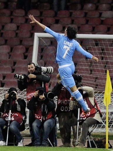 Napoli&#039;s Edinson Cavani reacts after scoring