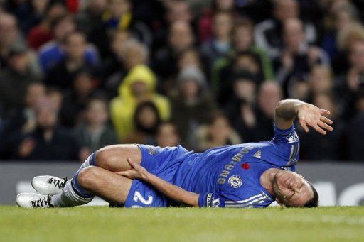 Chelsea&#039;s John Terry reacts after being injured