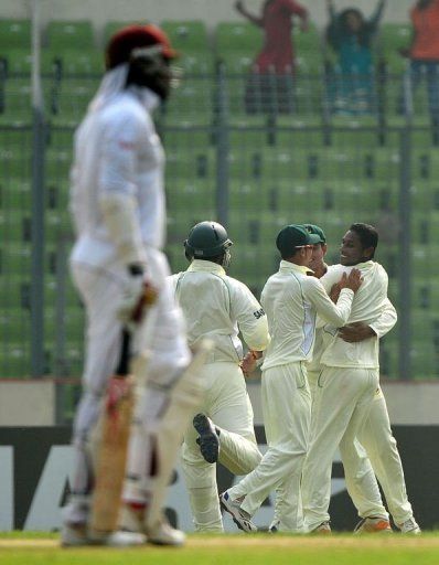 Bangladesh spinner Sohag Gazi (R) took two key wickets and a good catch against West Indies today