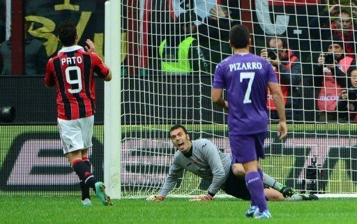 Pato (L) misses a penalty shot during the Serie A match between AC Milan and Fiorentina