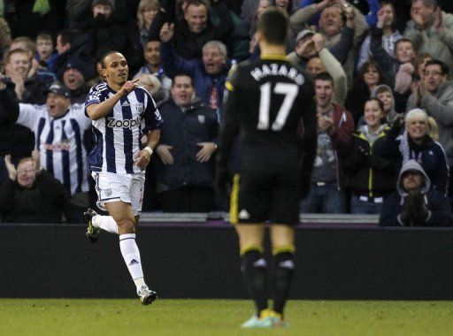 West Bromwich Albion&#039;s Peter Odemwingie (L) celebrates scoring