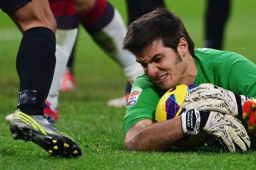 Cagliari's goalkeeper Michael Agazzi saves the ball