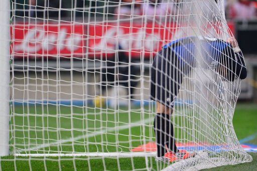 Inter Milan&#039;s Diego Milito reacts after missing a goal