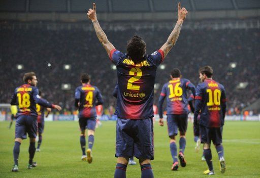 Barcelona&#039;s Daniel Alves celebrates scoring against Spartak