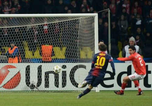 Barcelona's Lionel Messi scores