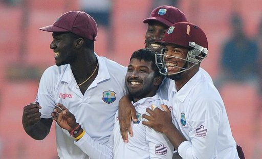 West Indies players celebrate the dismissal of Bangladeshi batsman Shakib Al Hasan (unseen)