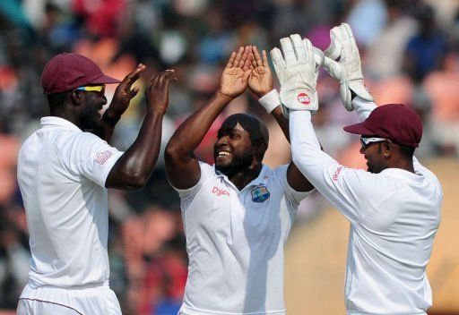 West Indies bowler Tino Best (centre) celebrates the dismissal of Bangladesh&#039;s Shahriar Nafees (unseen)