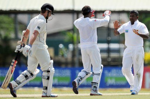 Rangana Herath grabbed two big wickets to lead Sri Lanka&#039;s fightback on the second day of the second and final Test
