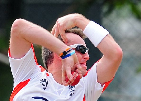 England&#039;s Graeme Swann delivers a ball d